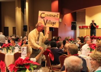 Dwayne Gabrielson of Covenant Village of Turlock rushing for Kettle Klash donations.