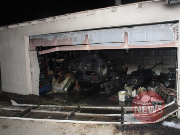Two Detached Garages Lost to Fire