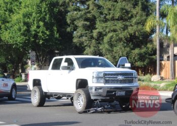 Bicyclist Injured After Being Struck by Lifted Truck