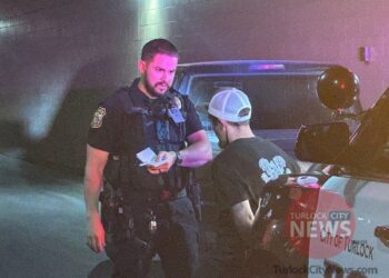 Man Arrested on Weapon and Narcotic Charges During Traffic Stop